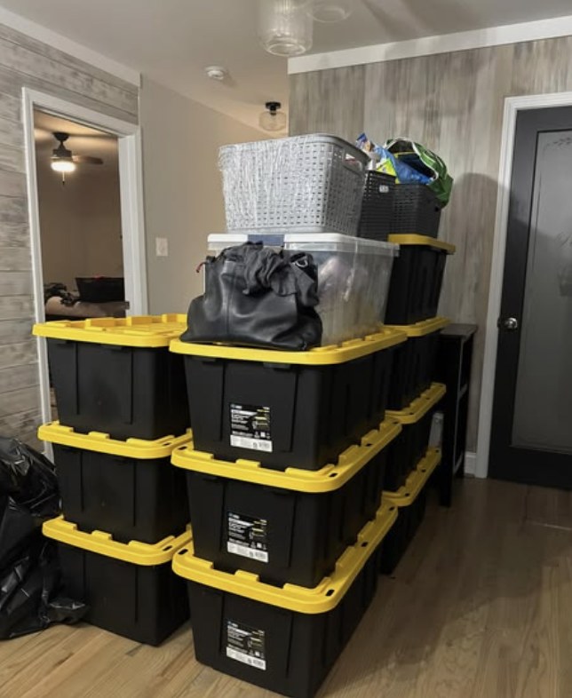 Stacked heavy-duty moving bins ready for a move