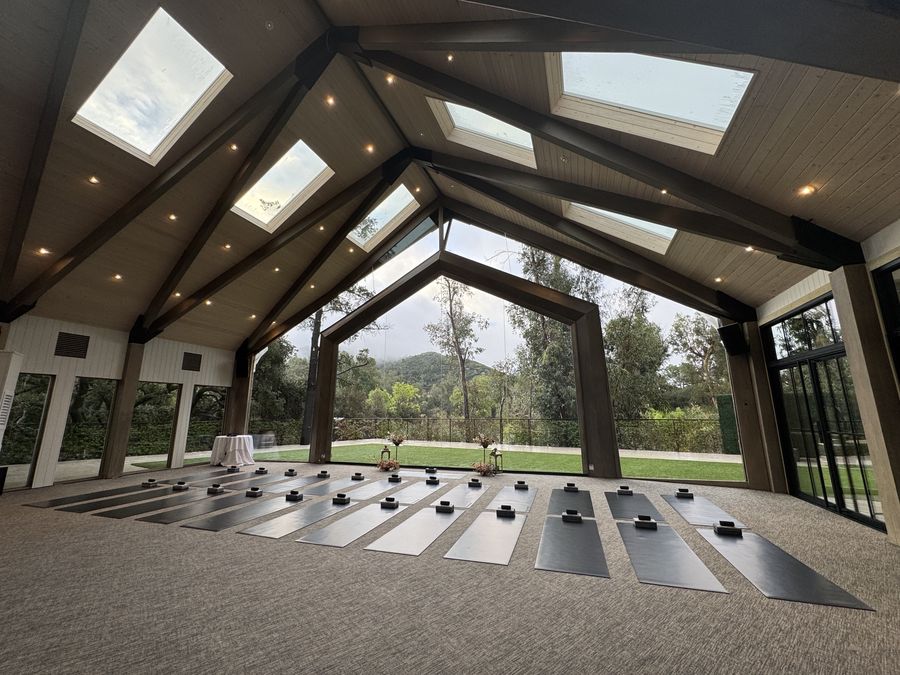 Event hall with vaulted skylights and mats set out in rows
